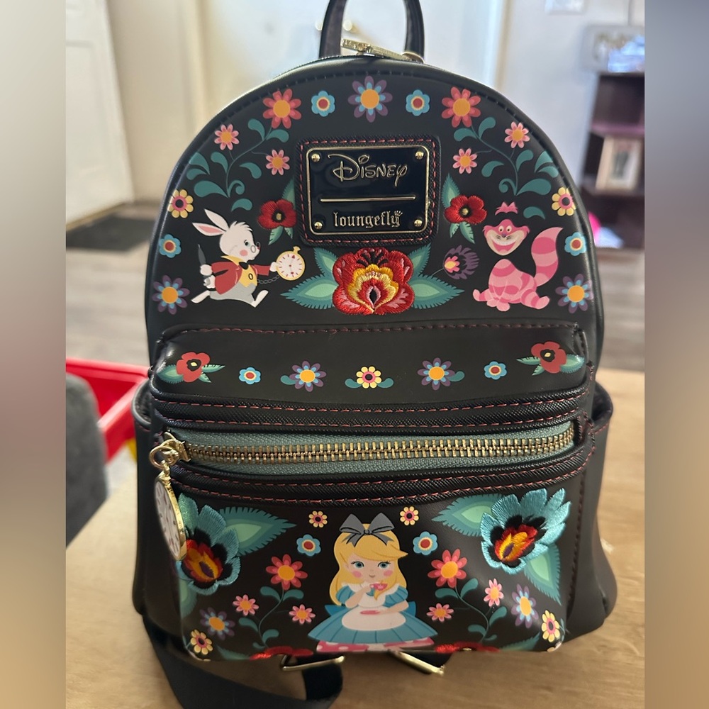 Alice in wonderland loungefly backpack